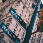 Wall Street Stocks Remain Nearly Flat as Investors Weigh Corporate Earnings